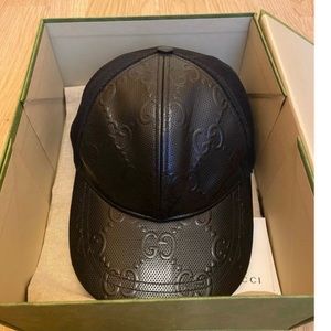 100 percent authentic Gucci leather hat. Comes with bag only.